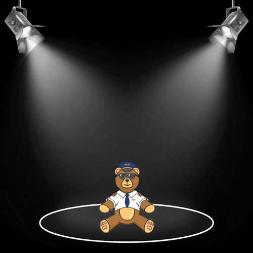 A small teddy bear dressed as a pilot